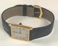CARTIER RECTANGULAR TANK MECANIQUE WOMEN'S WATCH, 18K, LEATHER STRAP, MODEL: 2027, S/N 896041 - New, With Box, No Papers<br />